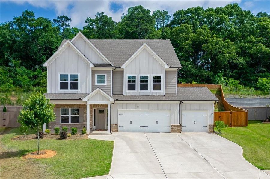 Front exterior of a new home in , Hoschton, GA, highlighting curb appeal (Image 1). Front exterior of a new home in , Hoschton, GA, highlighting curb appeal (Image 1).