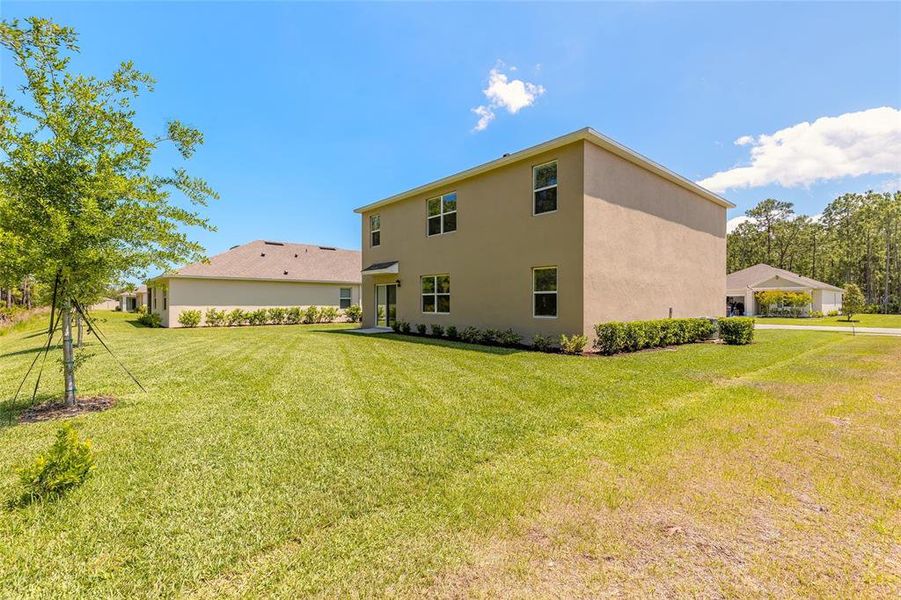 Exterior details and patio area of a home in Fountain View, Ormond Beach (Image 3).