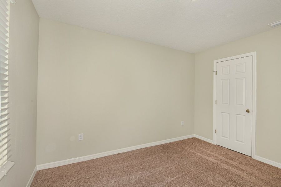 Spacious, unfurnished interior of a new home in Scenic Terrace, Haines City (Image 18).