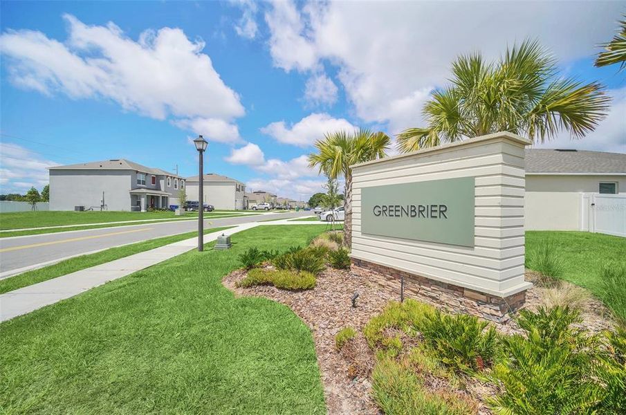 Front exterior of a new home in Greenbrier, Tavares, FL, highlighting curb appeal (Image 24).