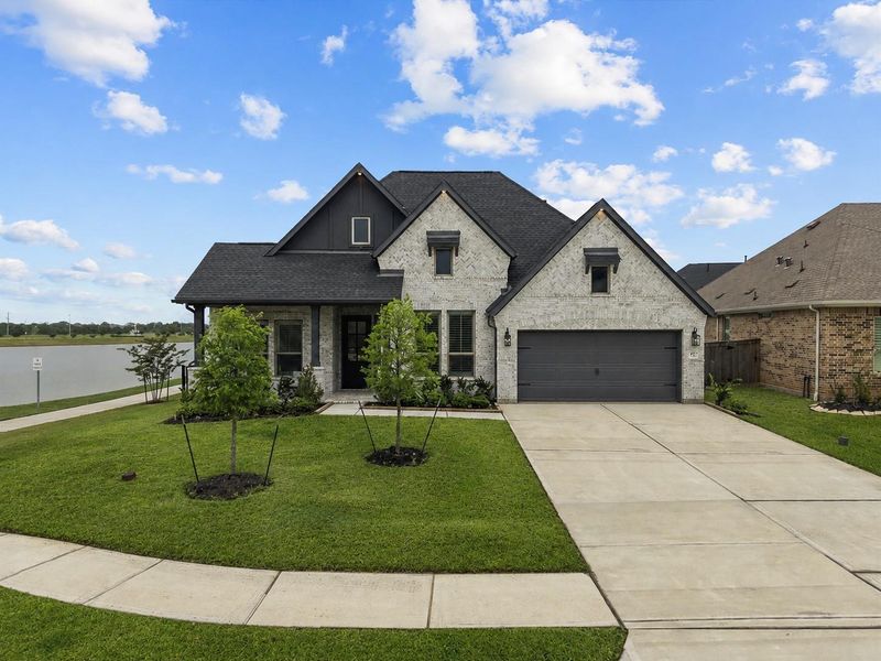 Stunning single-story home loaded with upgrades. 4 bedroom, 4 full bath home situated on a premium waterfront lot.