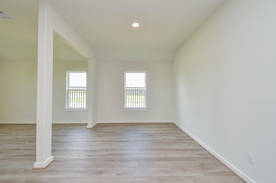 Spacious, unfurnished interior of a new home in Sunterra, Katy (Image 19).