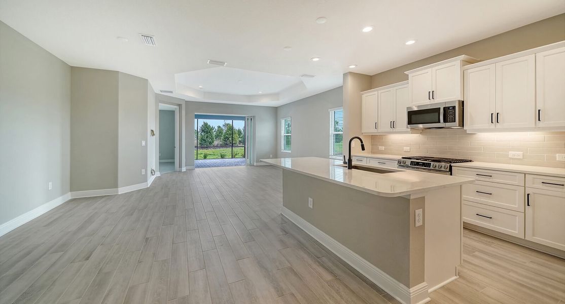 Furnished interior view inside a new home in Palm Grove, Lakewood Ranch (Image 6). Furnished interior view inside a new home in Palm Grove, Lakewood Ranch (Image 6).