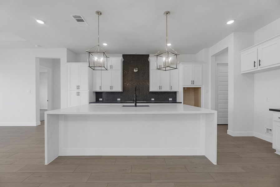 Furnished interior view inside a new home in Sienna, Missouri City (Image 7).