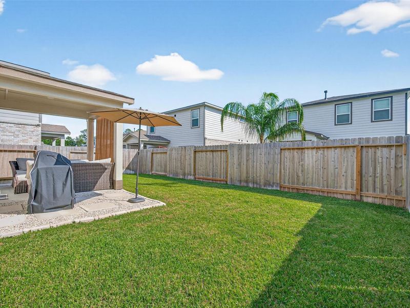 Exterior details and patio area of a home in Lakes at Black Oak, Magnolia (Image 25). Exterior details and patio area of a home in Lakes at Black Oak, Magnolia (Image 25).