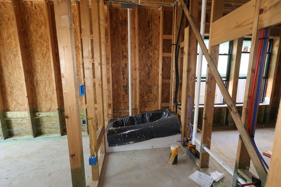 In-progress construction of a new home in Riceland - Enclave Row Collection, Mont Belvieu, TX (Image 10).