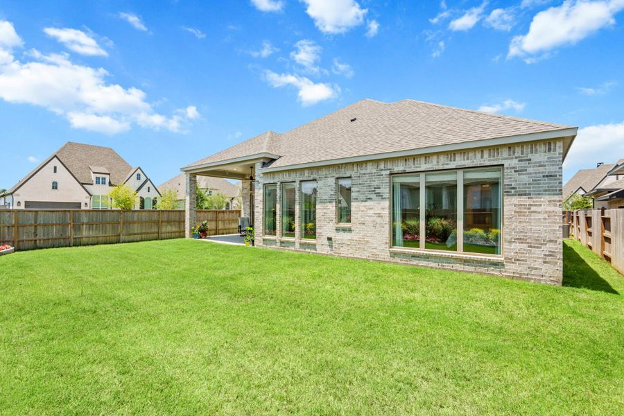 Exterior details and patio area of a home in Fulbrook on Fulshear Creek, Fulshear (Image 3).