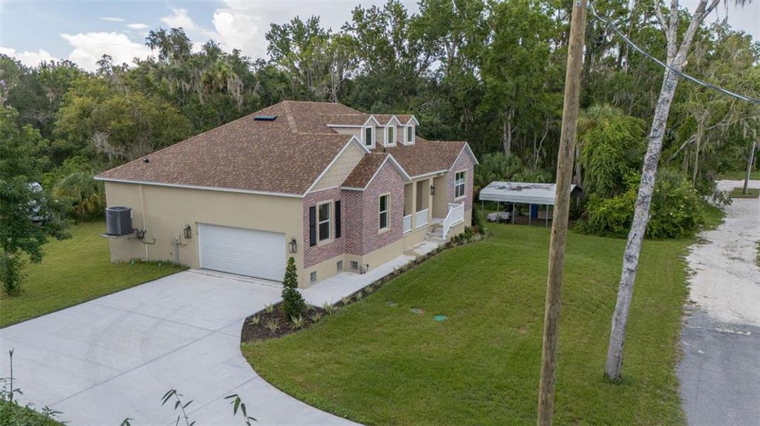 Front exterior of a new home in , Riverview, FL, highlighting curb appeal (Image 29). Front exterior of a new home in , Riverview, FL, highlighting curb appeal (Image 29).