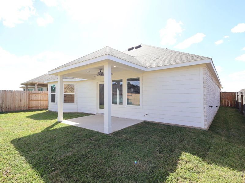 Exterior details and patio area of a home in Magnolia Ridge, Magnolia (Image 16).