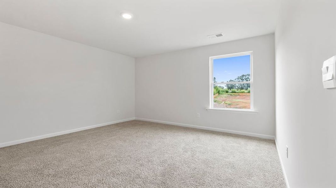 Spacious, unfurnished interior of a new home in Bentley Park, Greenwood (Image 28). Spacious, unfurnished interior of a new home in Bentley Park, Greenwood (Image 28).