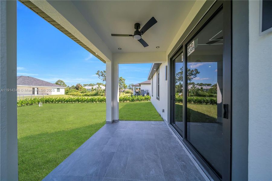 Exterior details and patio area of a home in , Lehigh Acres (Image 25). Exterior details and patio area of a home in , Lehigh Acres (Image 25).