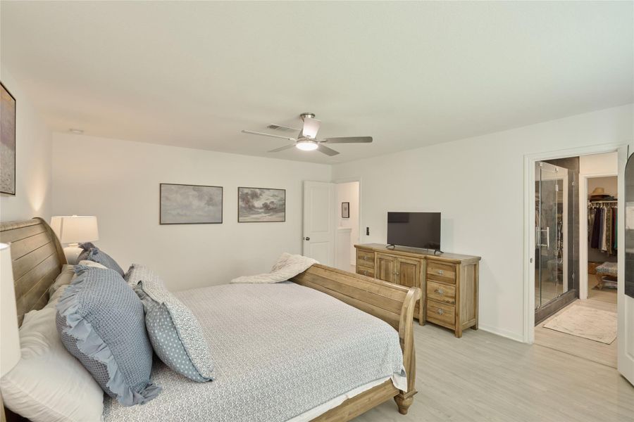 Furnished interior view inside a new home in The Pines At Seven Coves, Willis (Image 39).