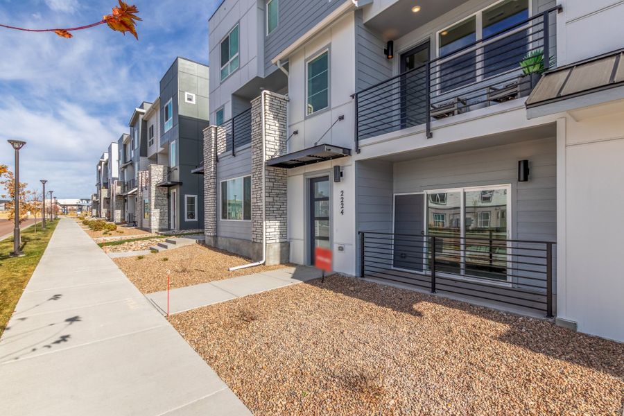 Exterior details and patio area of a home in The Commons at Victory Ridge, Colorado Springs (Image 28).