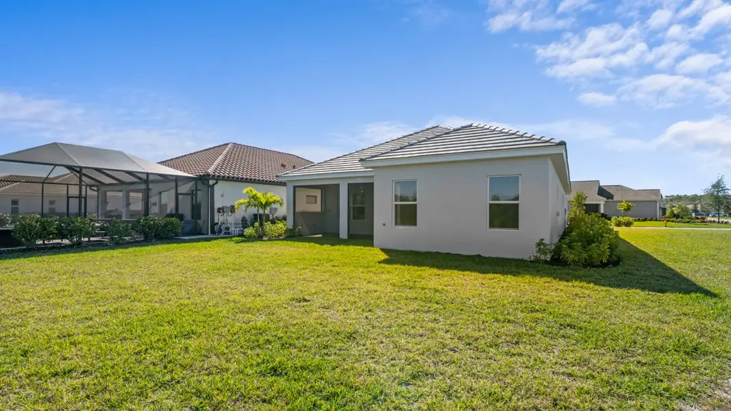 Exterior details and patio area of a home in Verandah, Fort Myers (Image 4).