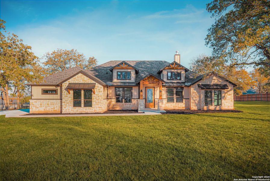Front exterior of a new home in , La Vernia, TX, highlighting curb appeal (Image 2). Front exterior of a new home in , La Vernia, TX, highlighting curb appeal (Image 2).
