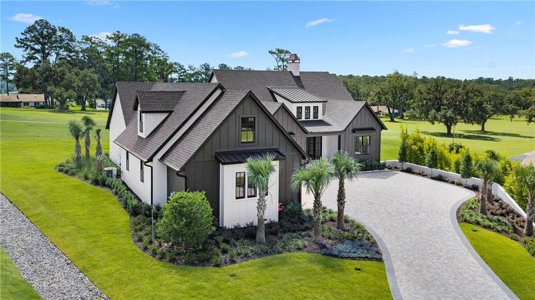 Front exterior of a new home in , Ocala, FL, highlighting curb appeal (Image 31).