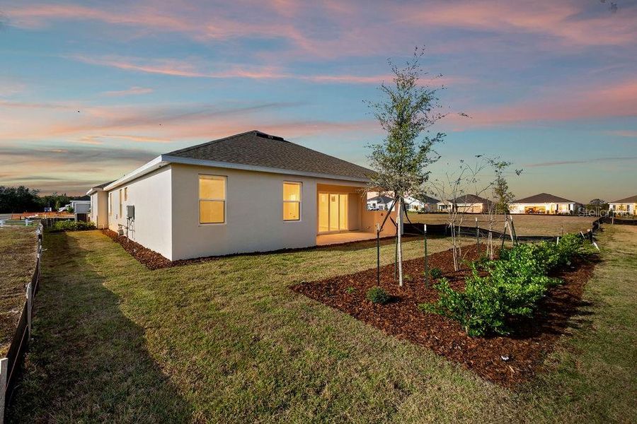 Exterior details and patio area of a home in Lakes of Mount Dora, Mount Dora (Image 23).