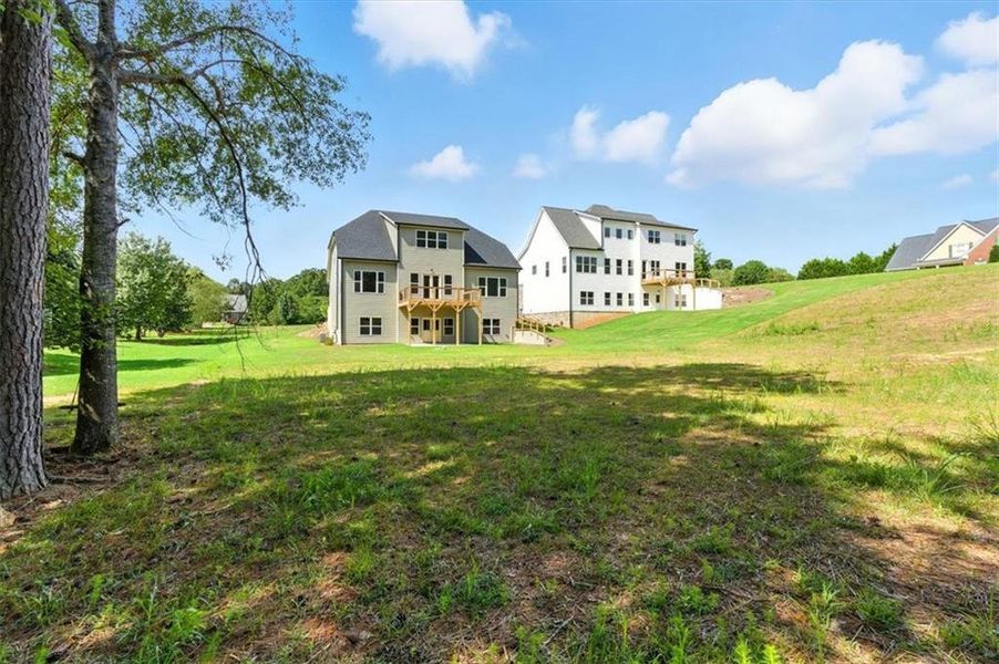Front exterior of a new home in , Rome, GA, highlighting curb appeal (Image 2). Front exterior of a new home in , Rome, GA, highlighting curb appeal (Image 2).