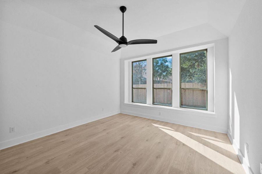 Primary Bedroom with elevated ceiling