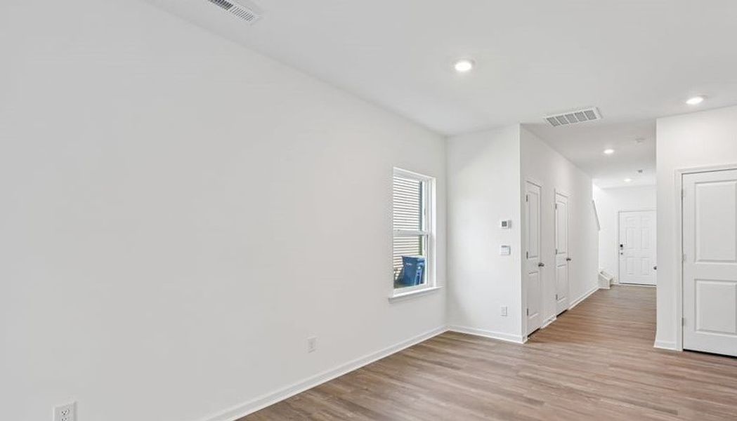 Spacious, unfurnished interior of a new home in The Townes at Belle Grove, Wendell (Image 7).