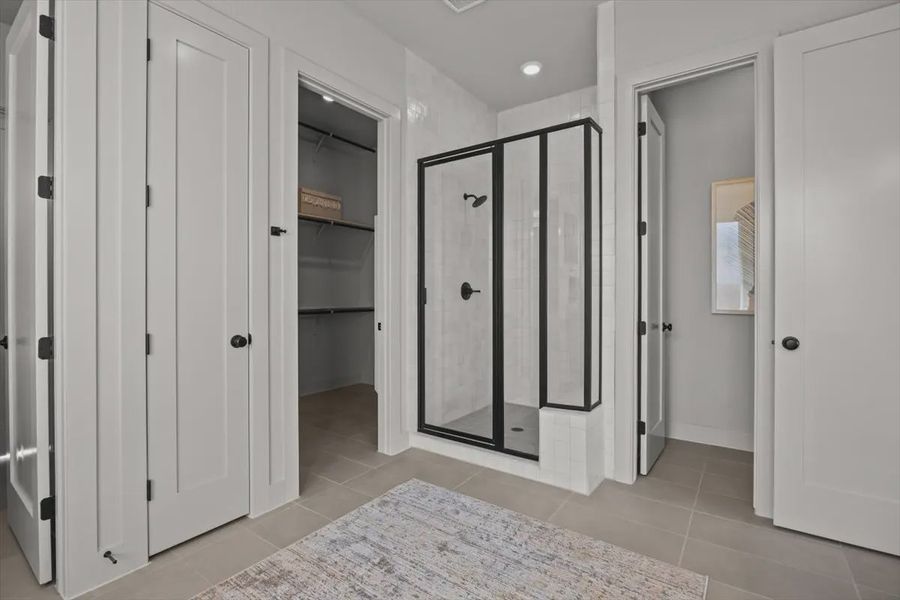 Representative furnished interior of a home built from the Malani by Chesmar Homes in Lakes of Cane Island, Katy (Image 12).