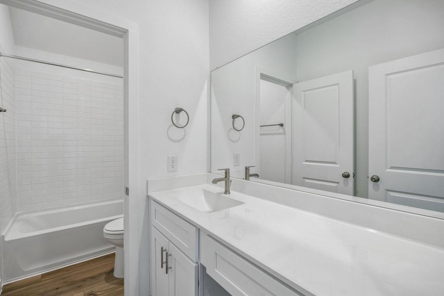 Furnished interior view inside a new home in Windcress, Cove (Image 6).