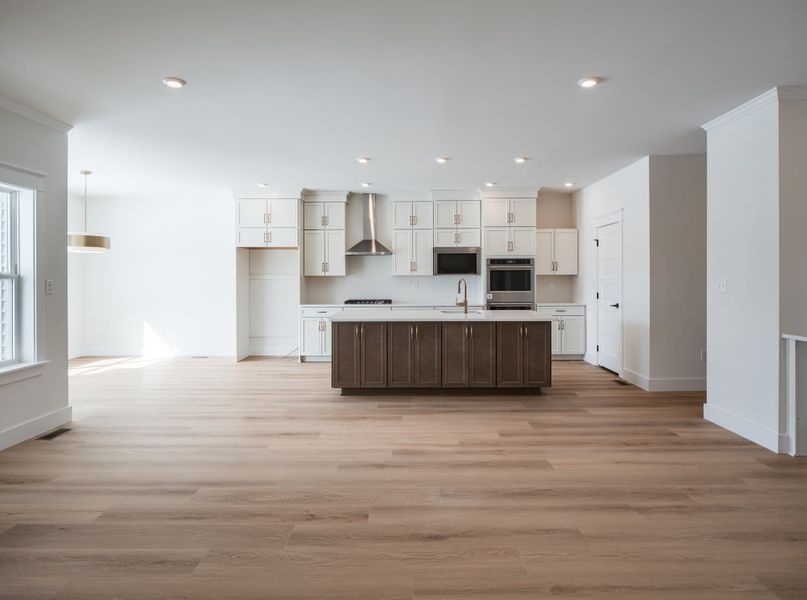 Representative furnished interior of a home built from the Woodford by Keystone Custom Homes in Lakestone Cove, Belmont (Image 5).