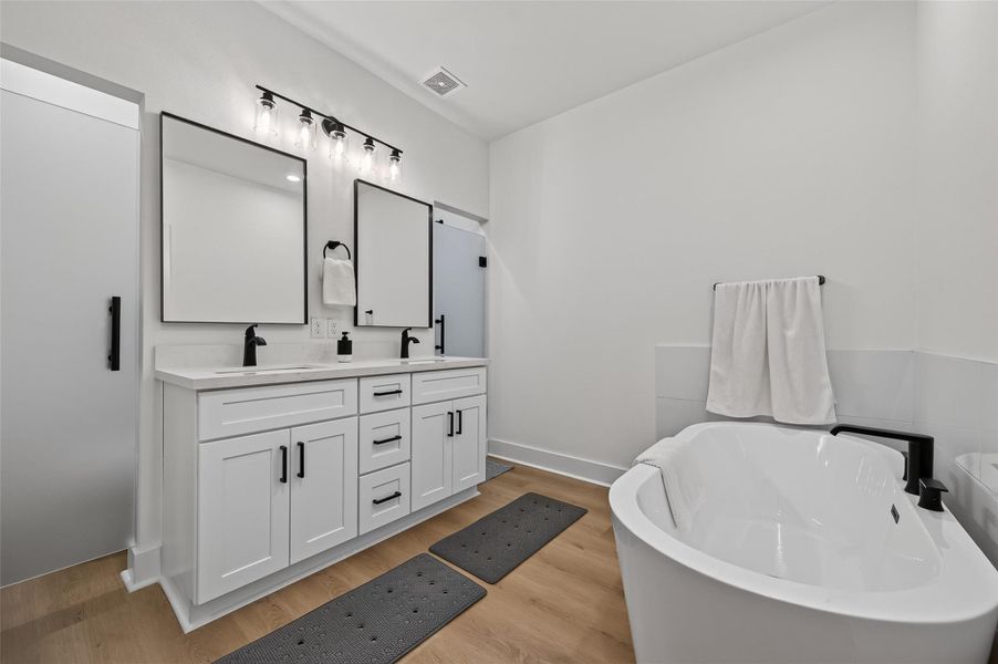 Furnished interior view inside a new home in , Conroe (Image 34).