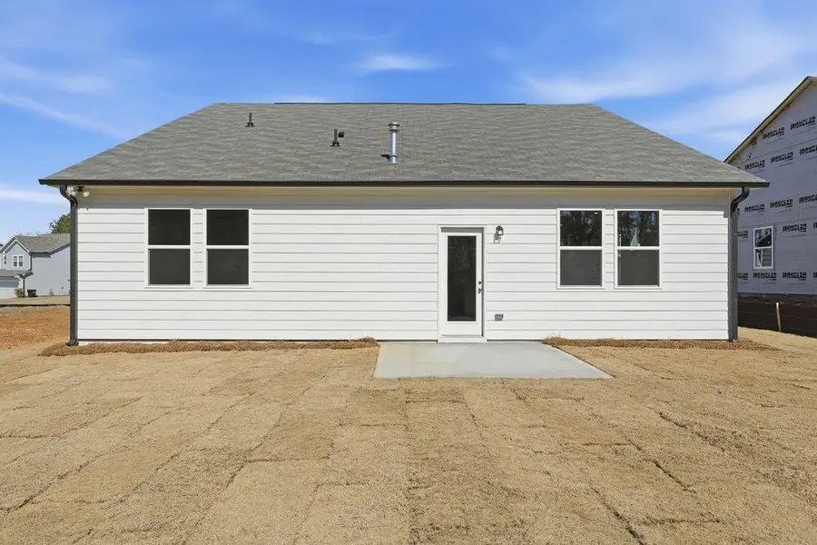 Exterior details and patio area of a home in Heritage River, Euharlee (Image 3).