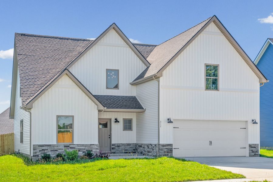 Front exterior of a new home in Cherry Fields, Clarksville, TN, highlighting curb appeal (Image 15).