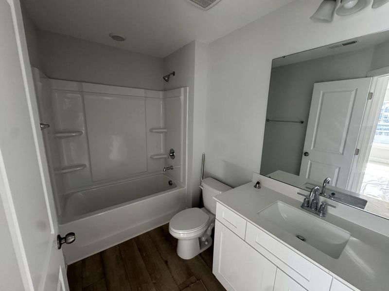 Furnished interior view inside a new home in Harrisburg Village Townhomes, Harrisburg (Image 4).