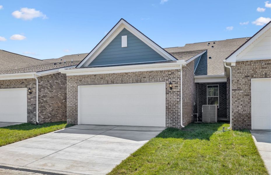 Front exterior of a new home in Bradshaw Farms Reserve, Mount Juliet, TN, highlighting curb appeal (Image 20). Front exterior of a new home in Bradshaw Farms Reserve, Mount Juliet, TN, highlighting curb appeal (Image 20).