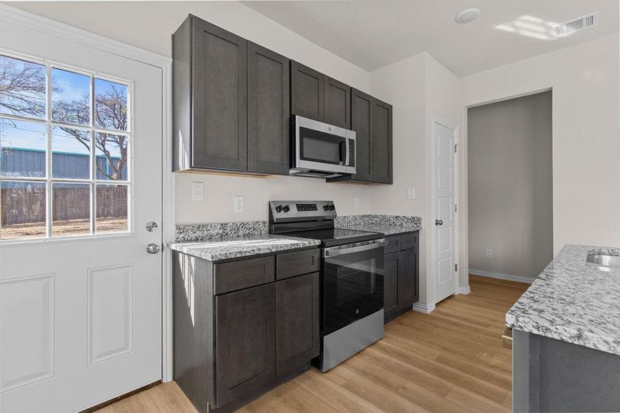 Furnished interior view inside a new home in , Fort Worth (Image 6).