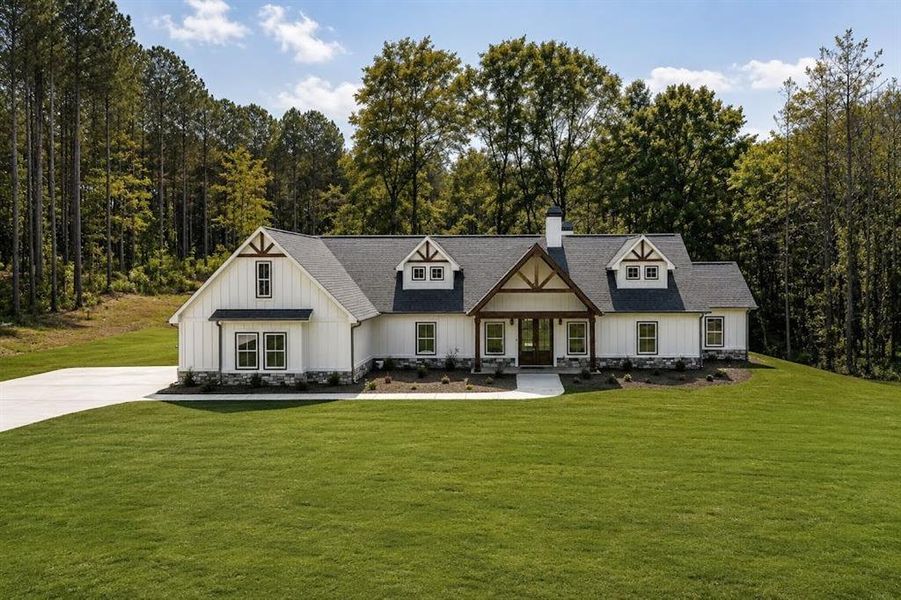 Front exterior of a new home in , Carrollton, GA, highlighting curb appeal (Image 30).