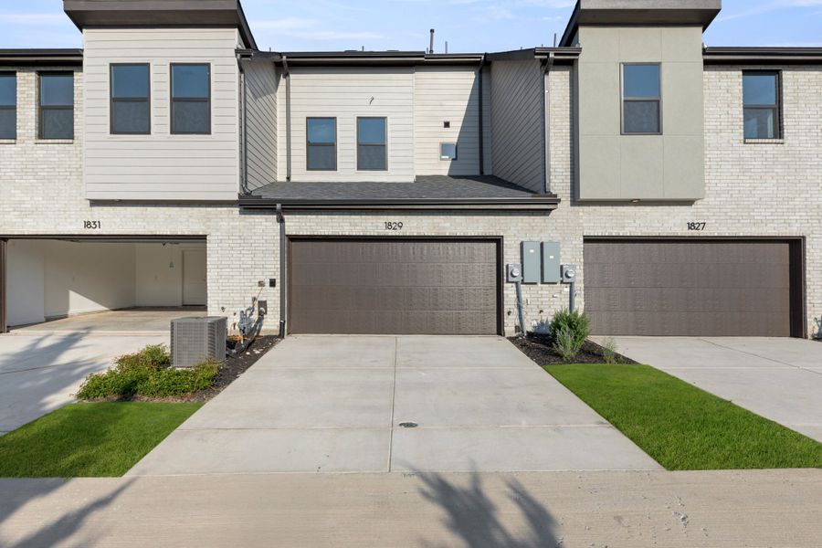 Front exterior of a new home in Ten Mile Creek, Celina, TX, highlighting curb appeal (Image 26). Front exterior of a new home in Ten Mile Creek, Celina, TX, highlighting curb appeal (Image 26).