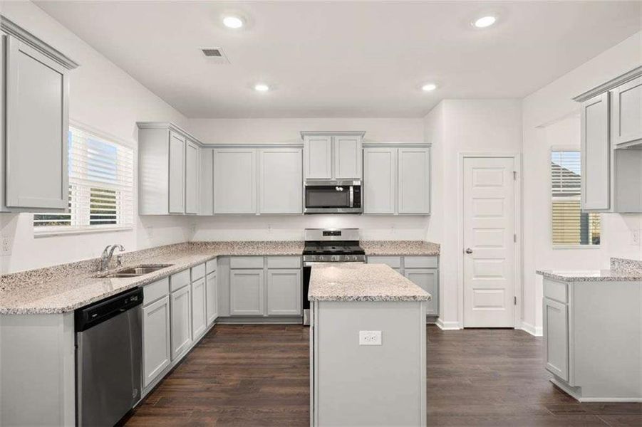 Furnished interior view inside a new home in Oakchase at Hampton, Hampton (Image 9).