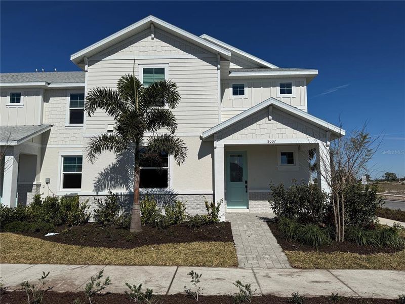 Front exterior of a new home in , Bradenton, FL, highlighting curb appeal (Image 1). Front exterior of a new home in , Bradenton, FL, highlighting curb appeal (Image 1).