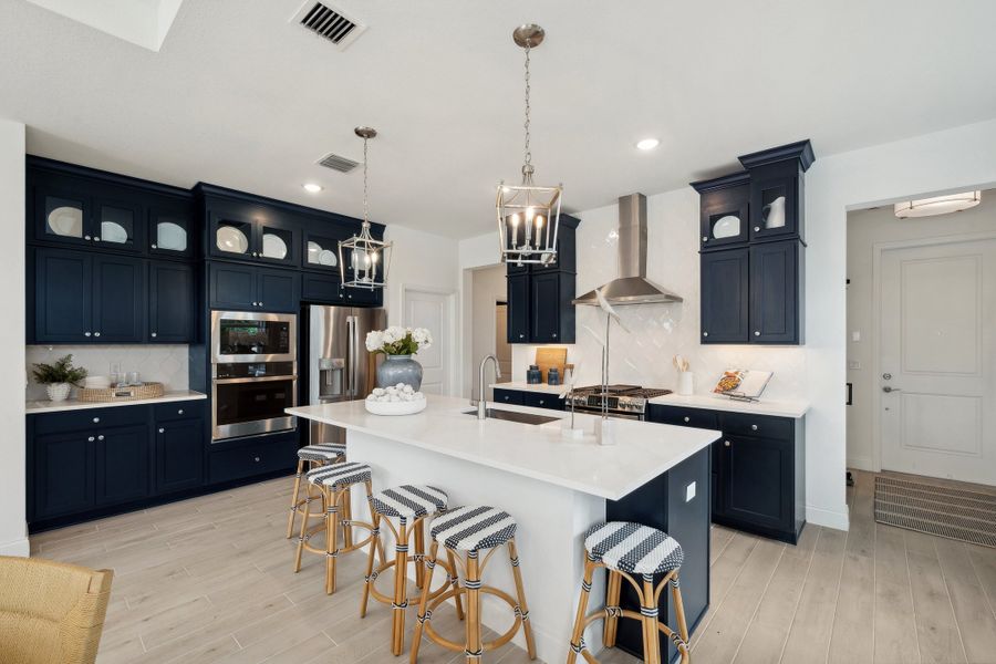 Kitchen with pendant lighting and center island