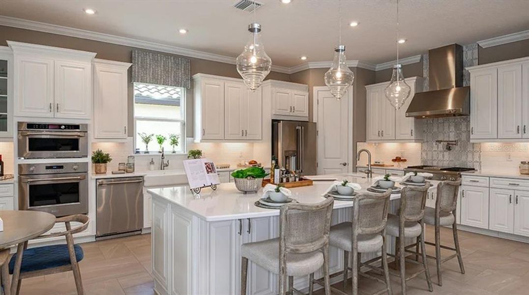 Furnished interior view inside a new home in Esplanade at Wiregrass Ranch, Wesley Chapel (Image 8). Furnished interior view inside a new home in Esplanade at Wiregrass Ranch, Wesley Chapel (Image 8).