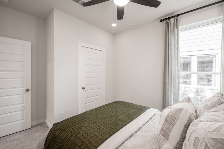 Representative furnished interior of a home built from the Caddo by Tri Pointe Homes in Mason Woods, Cypress (Image 28).