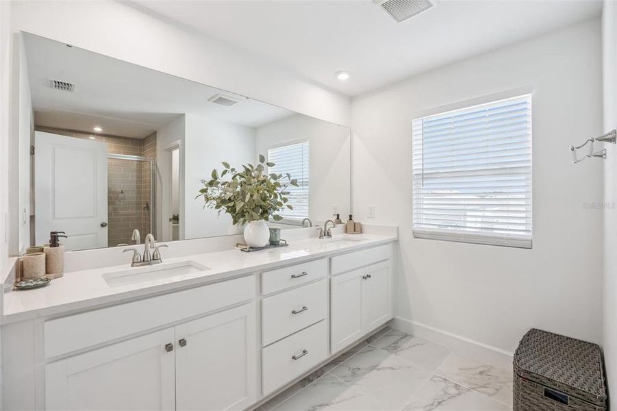 Furnished interior view inside a new home in Waterbrooke, Clermont (Image 33).