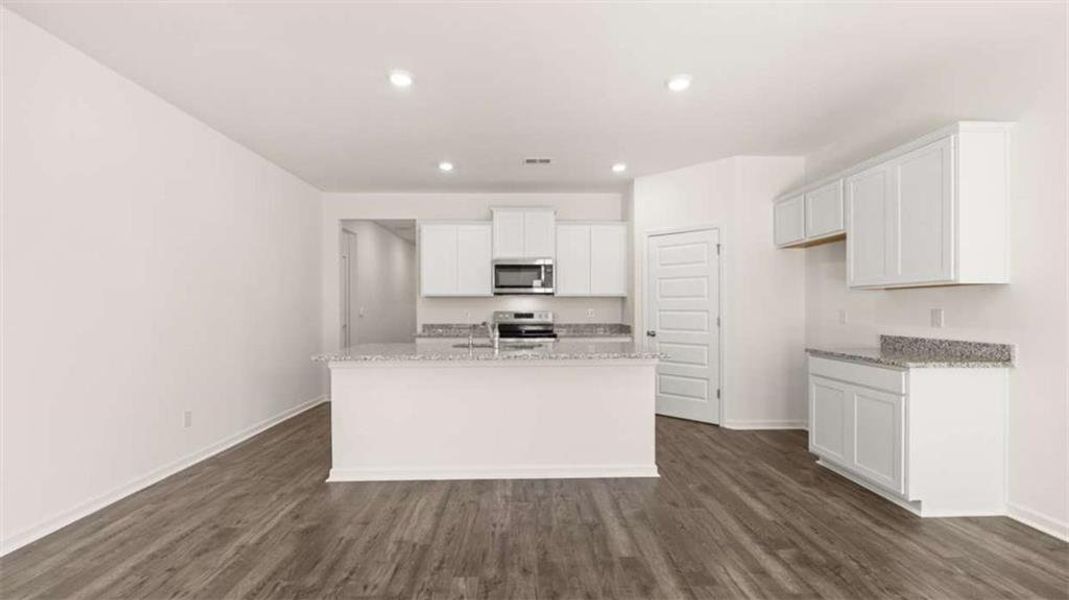Furnished interior view inside a new home in Oakchase at Hampton, Hampton (Image 7).