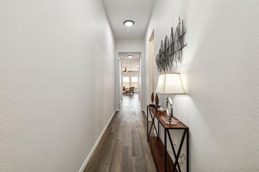 Corridor featuring dark hardwood / wood-style flooring