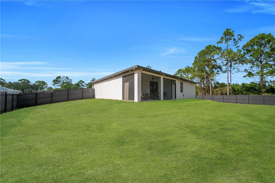 Exterior details and patio area of a home in , Lehigh Acres (Image 4).