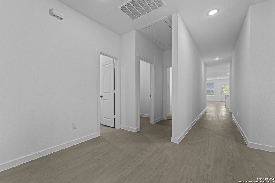 Spacious, unfurnished interior of a new home in Waterwheel: Coastline Collection, San Antonio (Image 23).