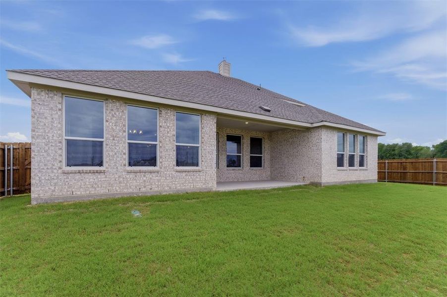 Exterior details and patio area of a home in Cedar Ridge Estates, Anna (Image 23).