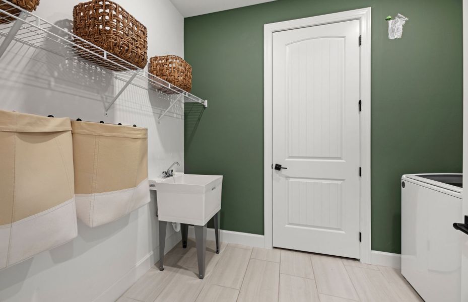 Laundry room with optional sink and shelving