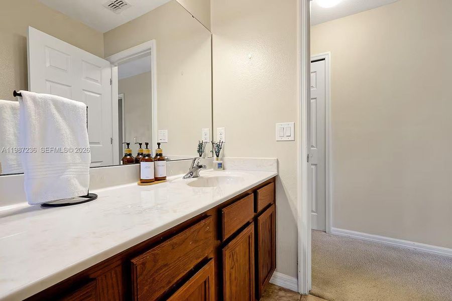 Furnished interior view inside a new home in , Kissimmee (Image 17).
