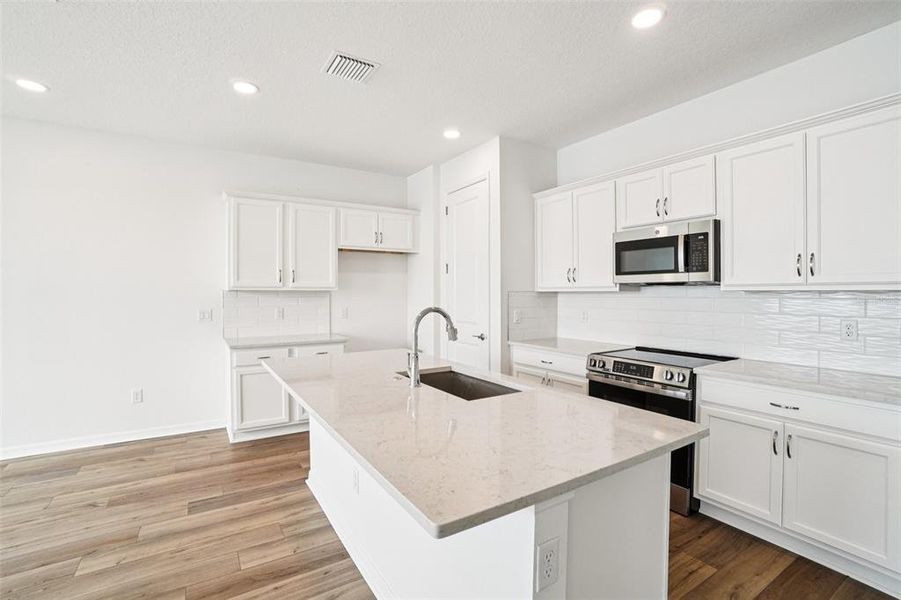 Furnished interior view inside a new home in Isla Mirada, San Antonio (Image 9).