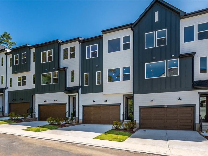 Front exterior of a new home in Archer Row, Charlotte, NC, highlighting curb appeal (Image 1).